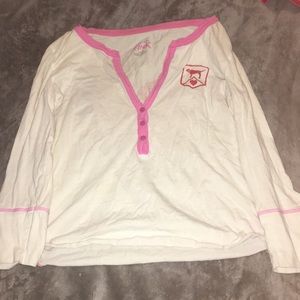 A Victoria’s Secret pink night wear shirt